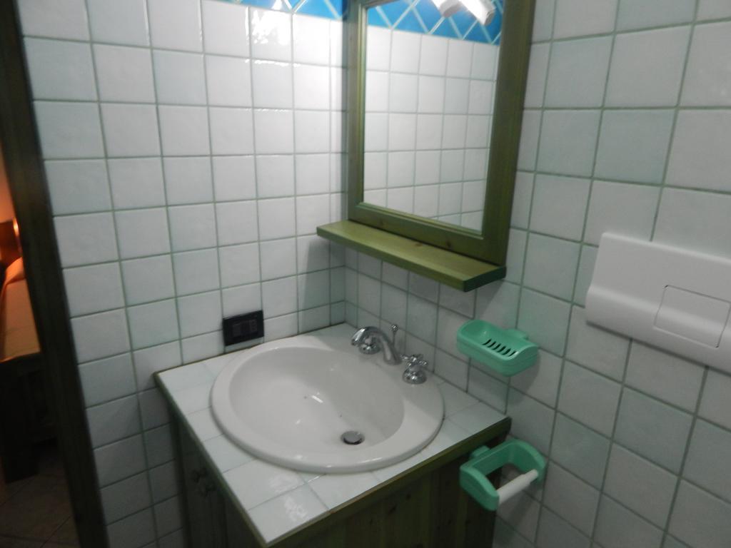 Appartamento Magnolia Cala Liberotto Zimmer foto