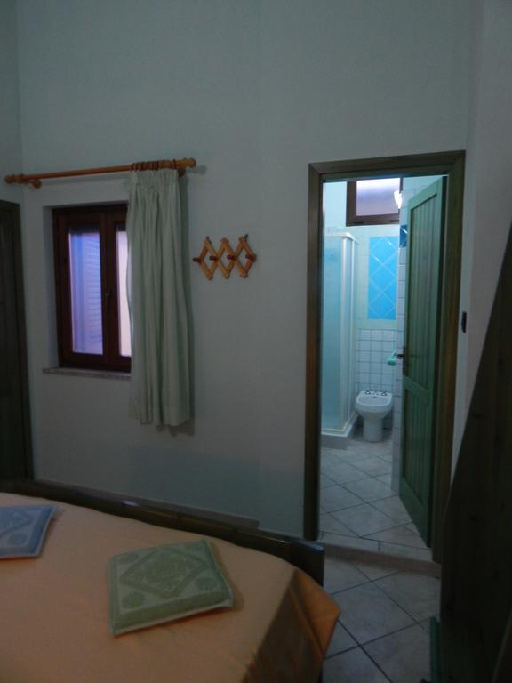 Appartamento Magnolia Cala Liberotto Zimmer foto